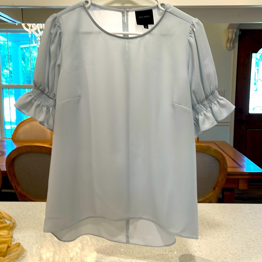 Greyed blue blouse